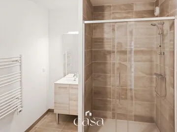 Grand T2 avec balcon, cave et 2 parkings - Agence Casa