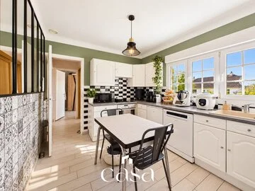 Maison avec sous-sol aménagé et jardin à Fleury-sur-Orne - Agence Casa